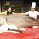 Illustration for article titled China's Monster Fish Ends Up in a Cheesy Photo Op